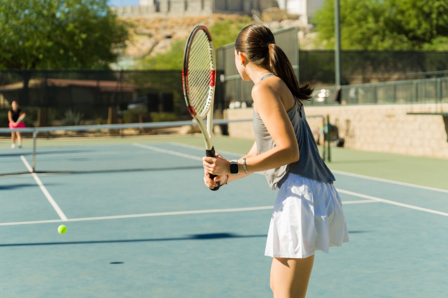 Protecting braces during sports, A girl playing tennis