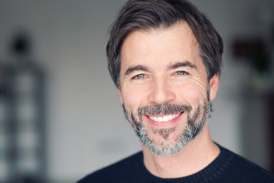 braces for adults, A man smiling