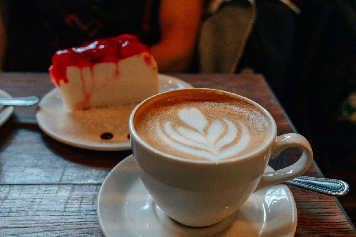 starting orthodontic treatment, An image of a piece of cheesecake and a coffee